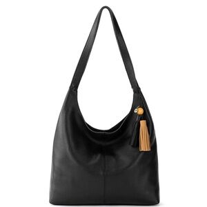 The Sak Huntley Hobo bag. Comes without nudes tassel. Multiple interior pockets.
